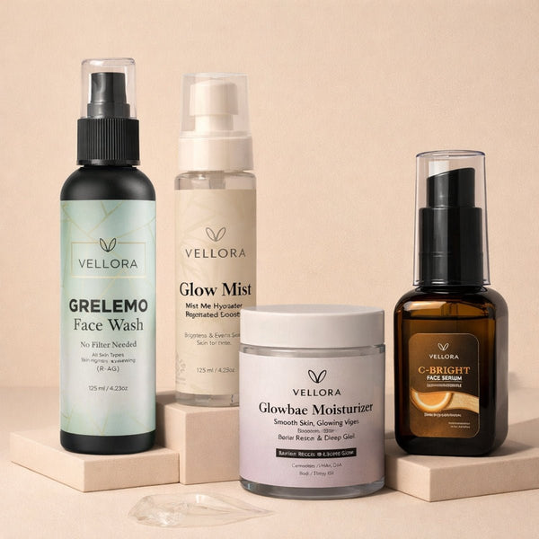 Vellora Complete Glow Routine for all skin types featuring Grelemo Face Wash, Glow Mist, Glowbae Moisturizer, and C-Bright Face Serum arranged in a minimal studio setup