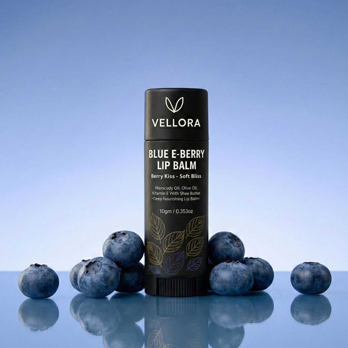 Vellora Blue E-Berry Lip Balm with real blueberries, deeply nourishing berry lip balm enriched with vitamin E, olive oil and shea butter for soft, smooth and hydrated lips.